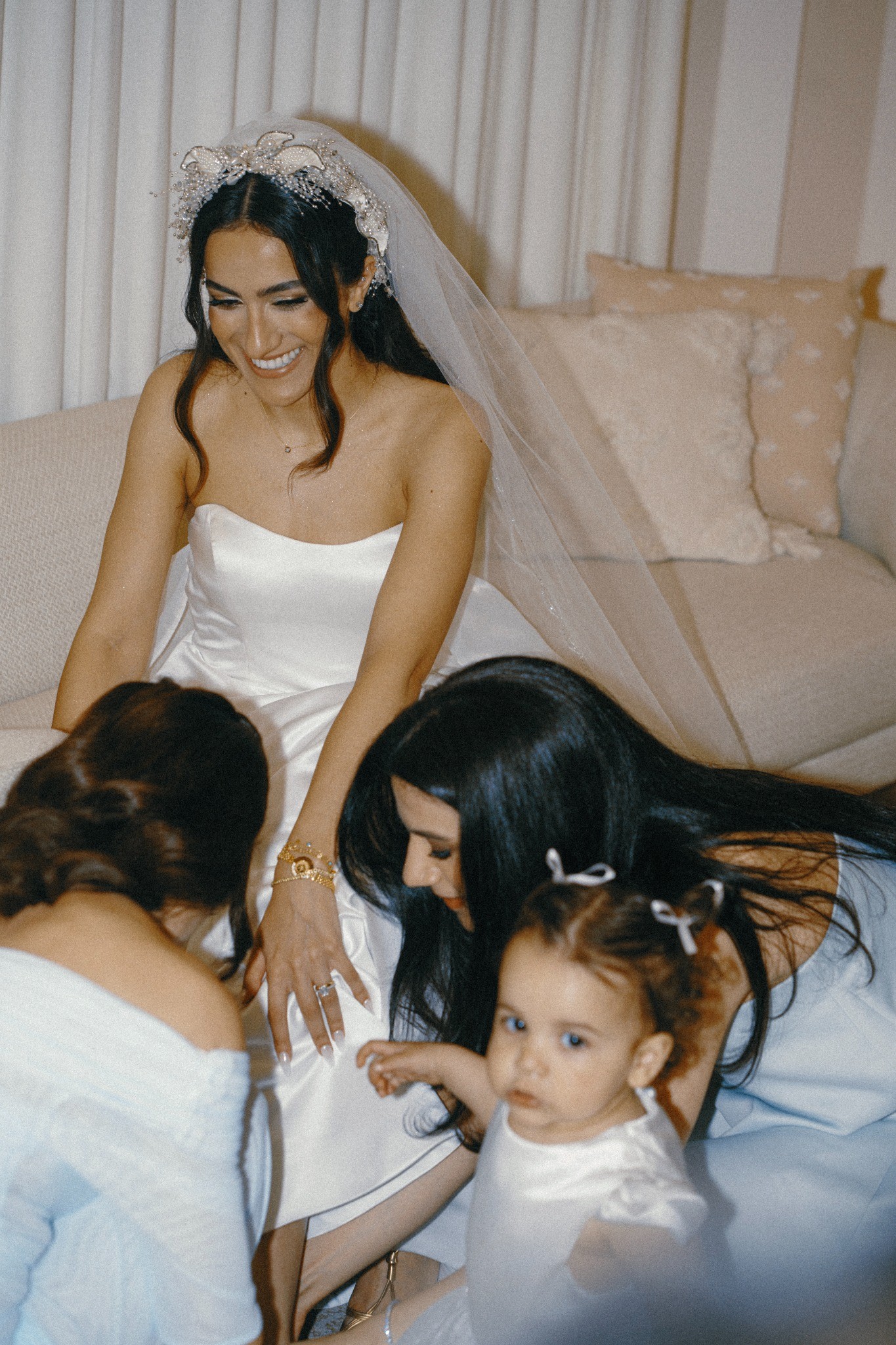 The bride sharing a tender moment with family